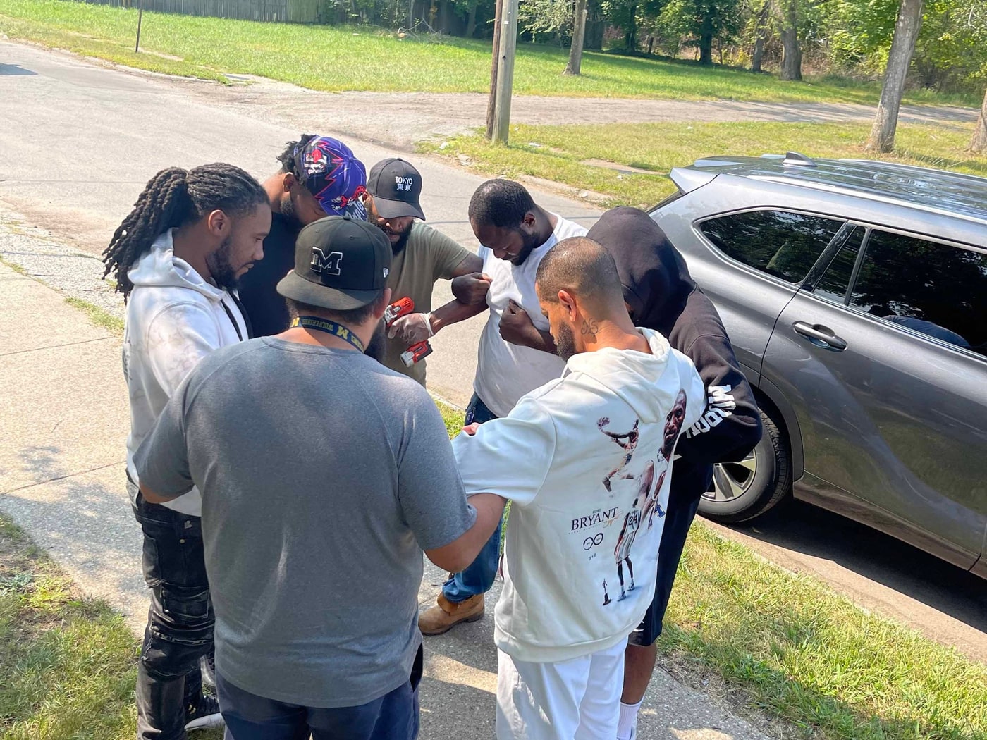 Ministry team praying together in unity